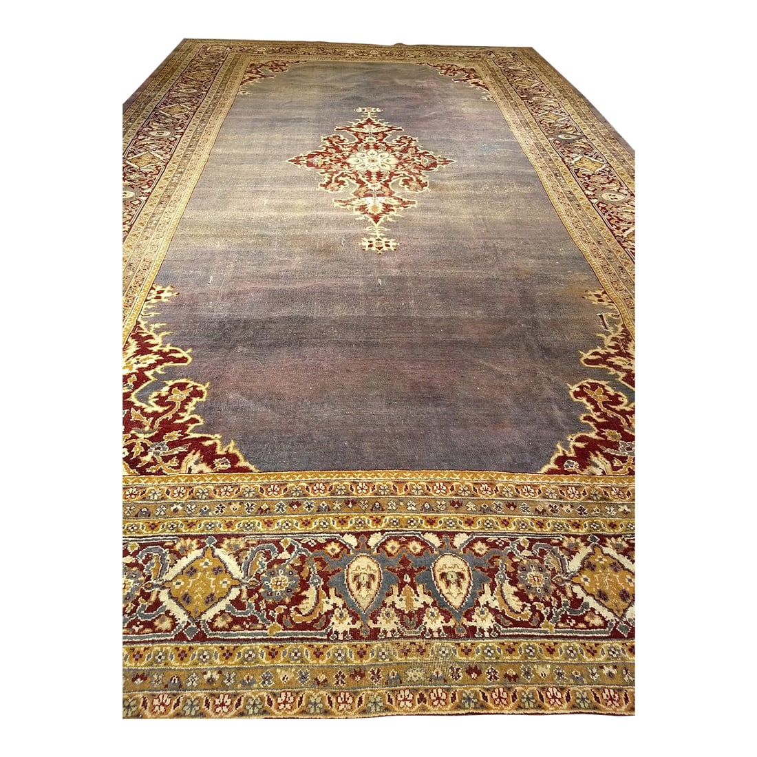 Antique Indian Agra Oversize Rug in Open Field in Blue/Purple: An elegant antique Indian Agra oversize rug, dating to the late 19th century. Characterized by its spacious open field, the composition is anchored by a striking central medallion"”an iconic