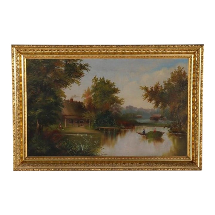 Hudson River School Oil on Canvas Painting of a River Scene 1890: An antique oil on canvas painting depicts a serene river scene. The work, dating to approximately 1890, captures a tranquil landscape with a thatched-roof cottage nestled among lush trees on the