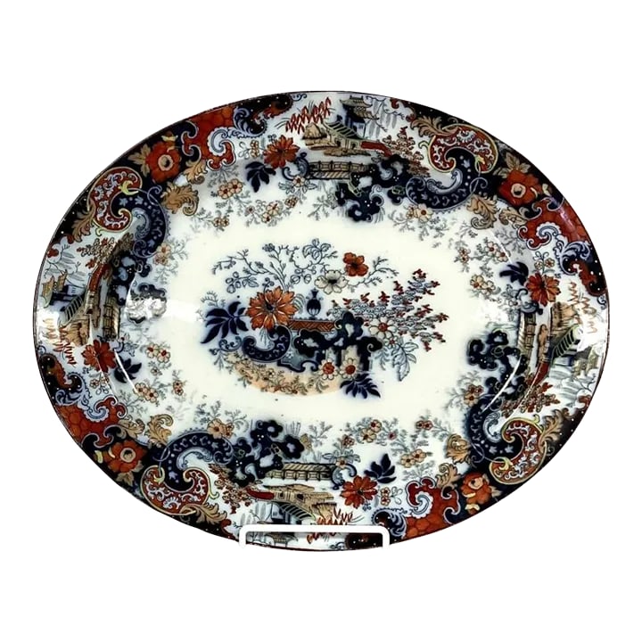 Large Oval English Japanned Platter: Rare 19th century English Ridgeways Imari pattern oval serving platter in excellent condition. The Bow and Quiver trade mark on reverse side was registered by Ridgeways in 1880. Reverse also has