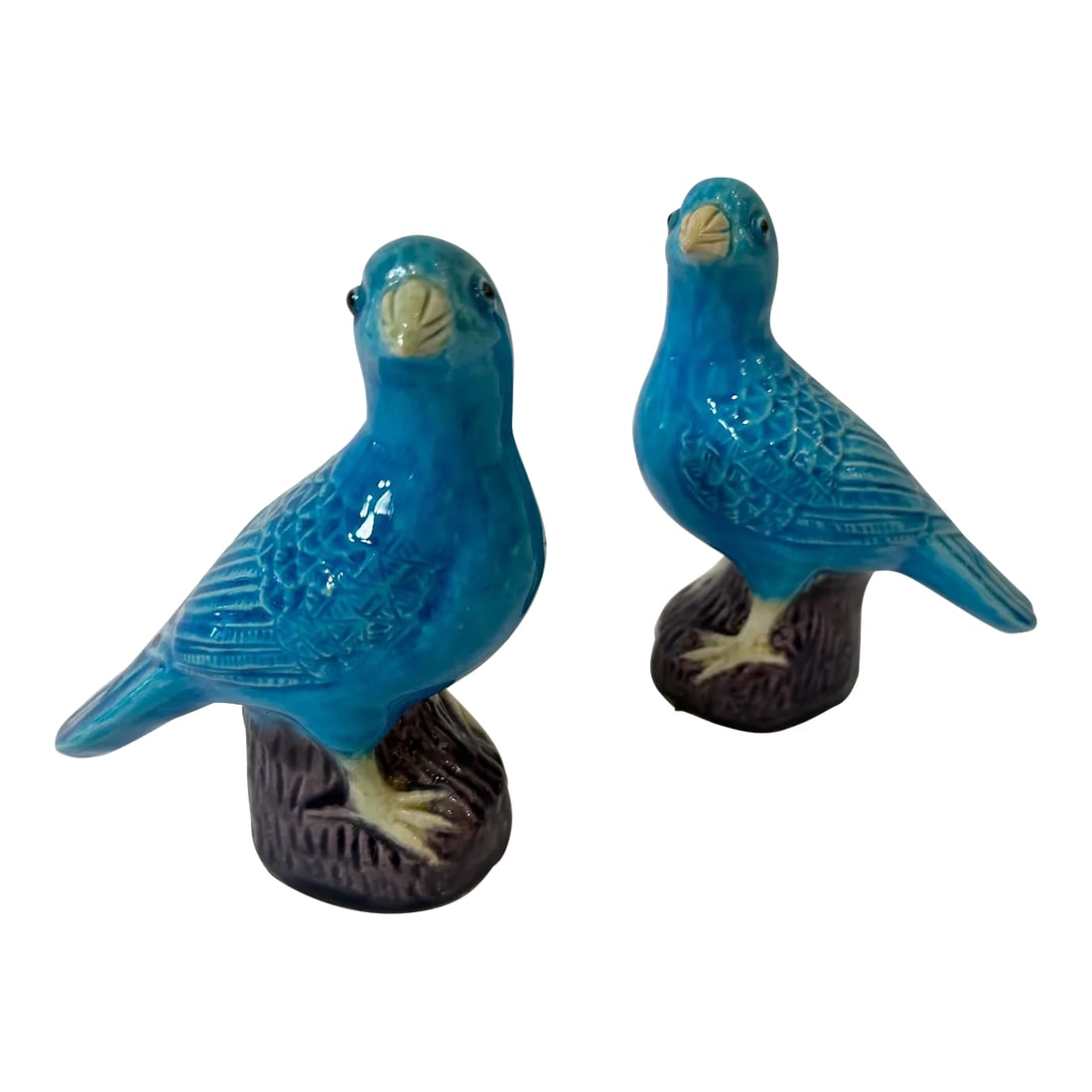 Turquoise Chinese Porcelain Bluebirds -A Pair: Pair of Chinese porcelain bluebirds having turquoise bodies and aubergine bases. Condition: Alterations: Original Condition Unaltered Imperfections: Some Imperfections Condition Notes: Good. Wear