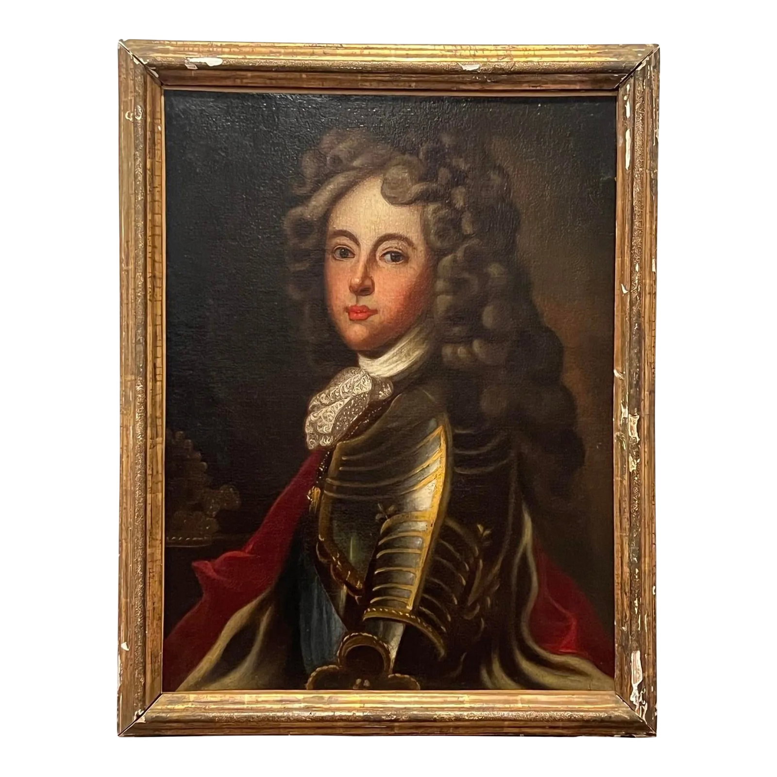 18th Century, French School Portrait of a Young Philip V, the King of Spain: French School, 18th century. Oil on Canvas painting set in an antique giltwood frame. Unsigned. An 18th century portrait painting of a young Philip V or at this time Duke of Anjou. He was dressed in