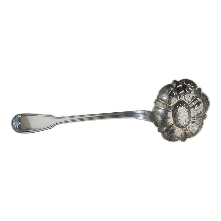 Christofle Silver-Plate Slotted Serving Spoon: Christofle silver-plated slotted serving Spoon. Cut out floral sprigs in the bowl with a quatrefoil shape. The spoon is hallmarked to the back with the Christofle hallmark prior to 1888. Beautiful