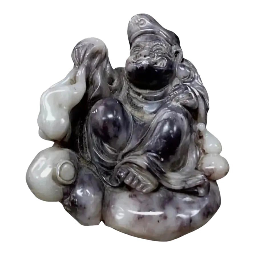 Chinese Carved Soapstone Desk Seal: 19th century soapstone desk seal. Features a Chinese character sitting with gourds. Color is a dark brownish-purple. Seal markings on on bottom. Condition: Alterations: Original Condition Unaltered