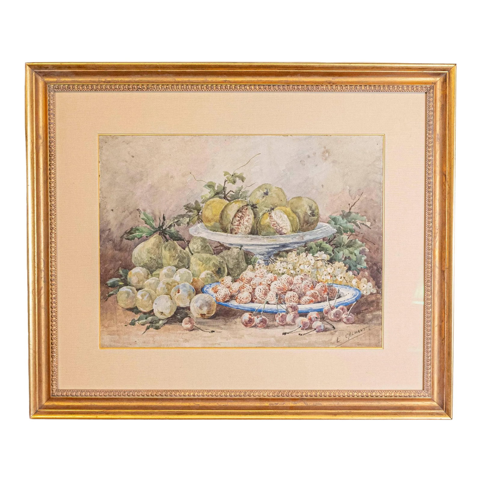 French Framed 19th Century Watercolor Depicting Fruits, Signed E Calmant: A French framed watercolor from the 19th century signed E Calmant, depicting fruits surrounded by foliage. Created in France during the second half of the 19th century by Calmant, a female watercolor