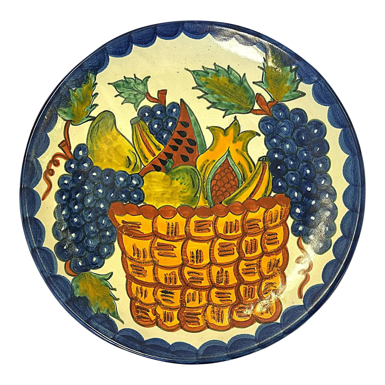 Vintage Large Hand Painted Mexican Talavera Pottery Platter: Colorful large vintage hand painted terra cotta platter. Made in the Mexican Talavera style and painted in bright shades of blue, green and yellow on a white background. It has an attached hook on
