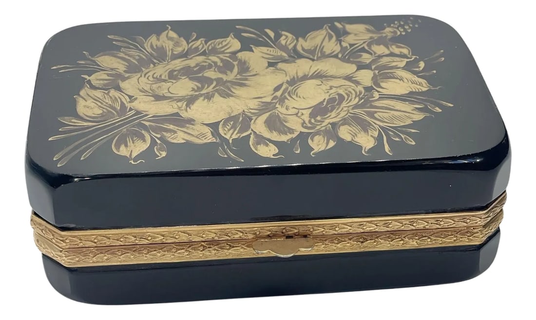 Black Murano Opaline Casket: A mid century black Italian opaline casket box with gold florals and brass trim. A very beautiful box ready to be displayed alone or added to a collection. Condition: Alterations: Original Condition