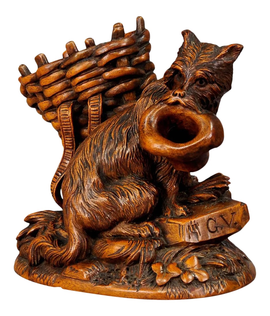 Black Forest Carved Begging Dog - Brienz Ca. 1900: Black Forest Wooden Carved Begging Dog - Brienz ca. 1900 A whimsical Swiss wood carving. A long hair terrier is begging with his masters hat beside a basket. Handcarved ca. 1900 in Switzerland in the