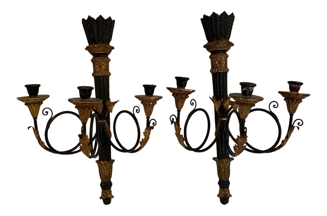 Black and Gold Italian Neoclassical Sconces - a Pair: Beautiful pair of carved ebonized wood sconces having neoclassical style gilded decoration. Note: A slightly different set of sconces is also listed to make a set of 4. Condition: Alterations: Origina