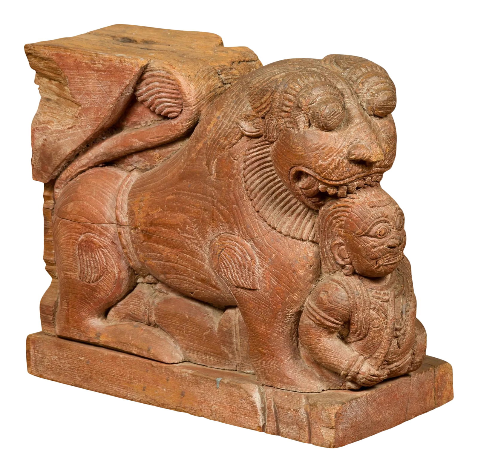 Indian 18th Century Teak Guardian Lion Carving with Traces of Original Paint: An Indian carved teak wood guardian lion sculpture from the mid-18th century, with traces of original paint. Handcrafted in India during the 1740s-1760s in order to take place in a monument, this