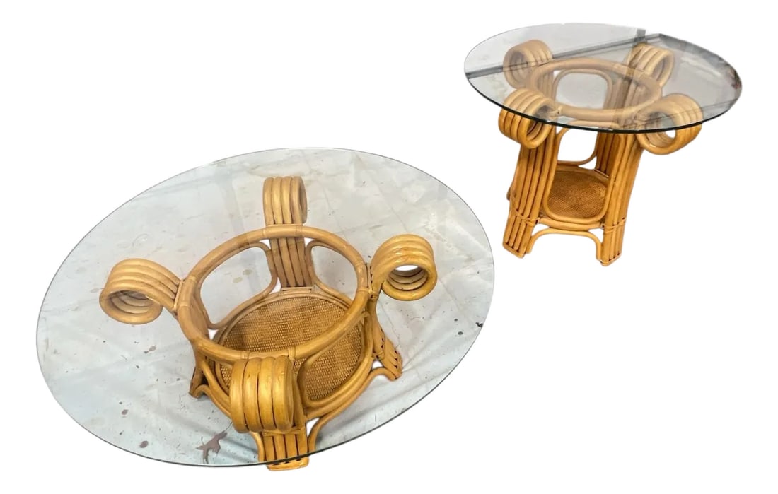 1970s Coastal Sculptural Bent Rattan Coffee and Side Table With Glass Tops - Set of 2: 1970s four band coastal sculptural scroll rattan coffee table snd matching side table. Each has a grasscloth bottom shelf. Each has a few minor scuffs but overall great condition and very sturdy.