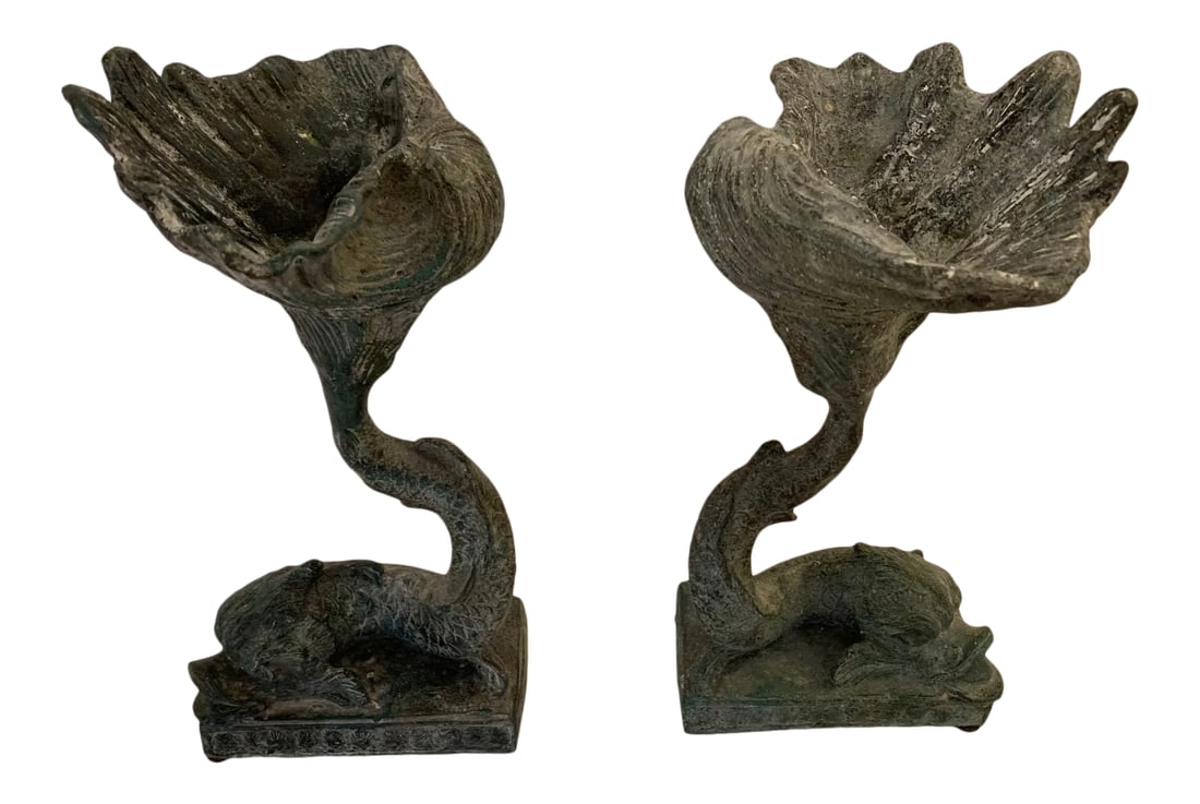 Lead Dolphin Motife Compotes -A Pair: A pair of unusually expressionistic lead compotes having stylized elongated shape, earthy greenish black patina, and beautiful dolphin motif bases. Condition: Alterations: Original Condition