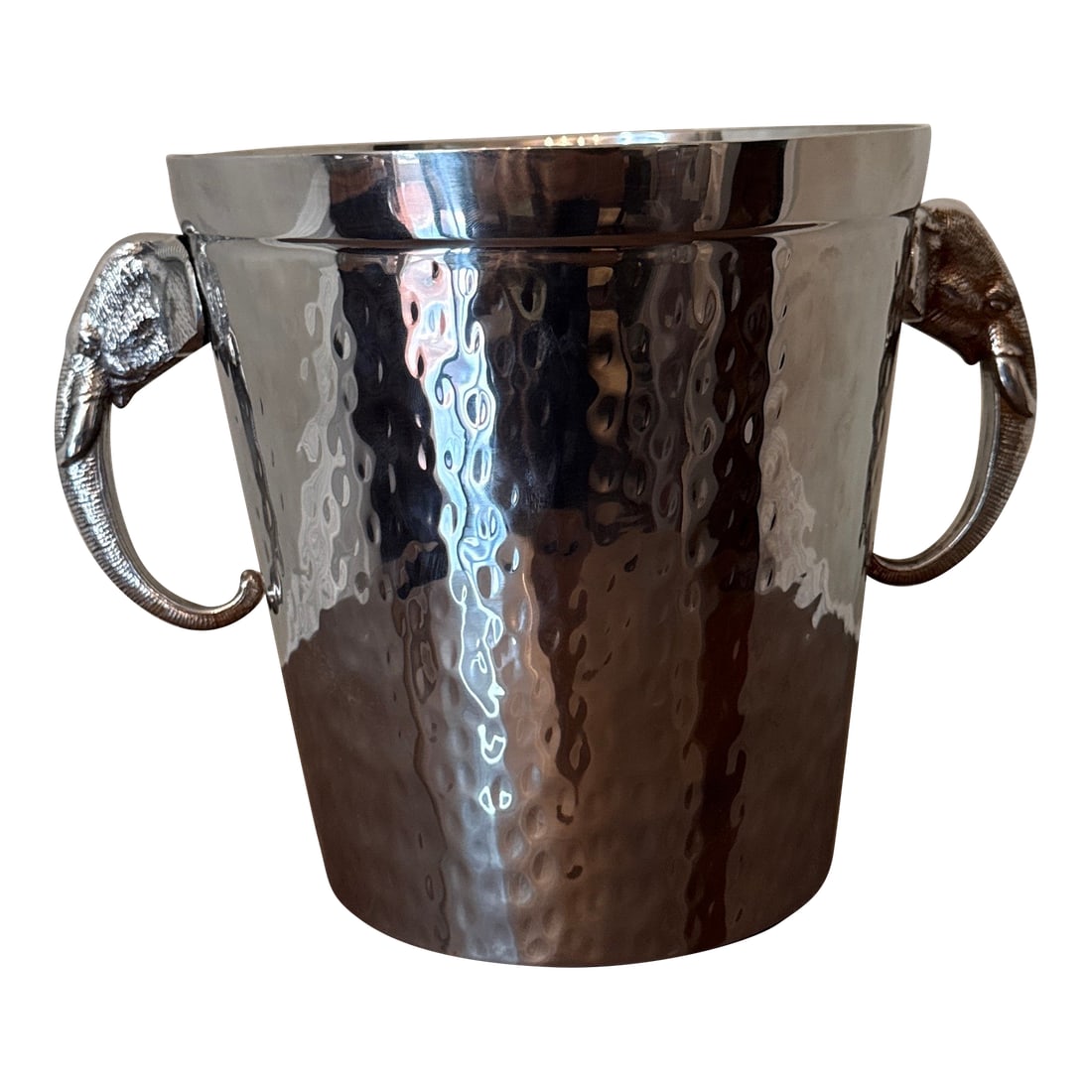 Vintage Elephant Hammered Stainless Steel Ice Bucket: Add a touch of elegance and safari charm to your entertaining setup with this beautifully crafted hammered stainless steel ice bucket. This eye-catching piece features detailed elephant head handles,