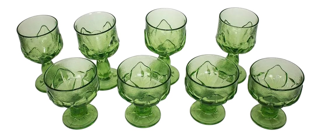 1960s Mid Century Modern Cabaret Green Glasses by Franciscan - Set of 8: Set of 8 mid century glasses from Franciscan in the Cabaret Green pattern. Includes 4 water goblets 6" high x 3 1/4" opening & 4 champagne/tall sherbet glasses 4 1/2 " high x 4" opening. Condition: Al