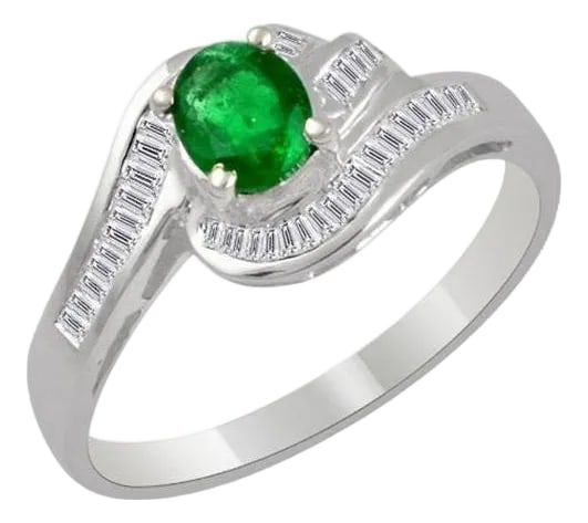 Natural Brazilian Emerald & Diamond Ring 18 Karat White Gold: Extreme fine quality of emerald , small size but beautiful 6 X 5 mm emerald , Oval in shape Intense green color, Beautiful stone with shine and luster Total Diamond weight Approximately 0.5 Ct