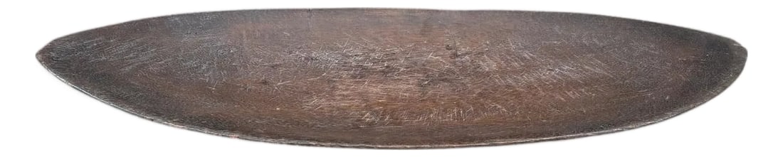 Antique Shallow Tray: Beautiful rare antique shallow tray from the Mentawai islands. Hand carved from a single piece of wood with lovely patina. Circa 1900. This antique tray was sourced in the spirit of Wabi-Sabi, a