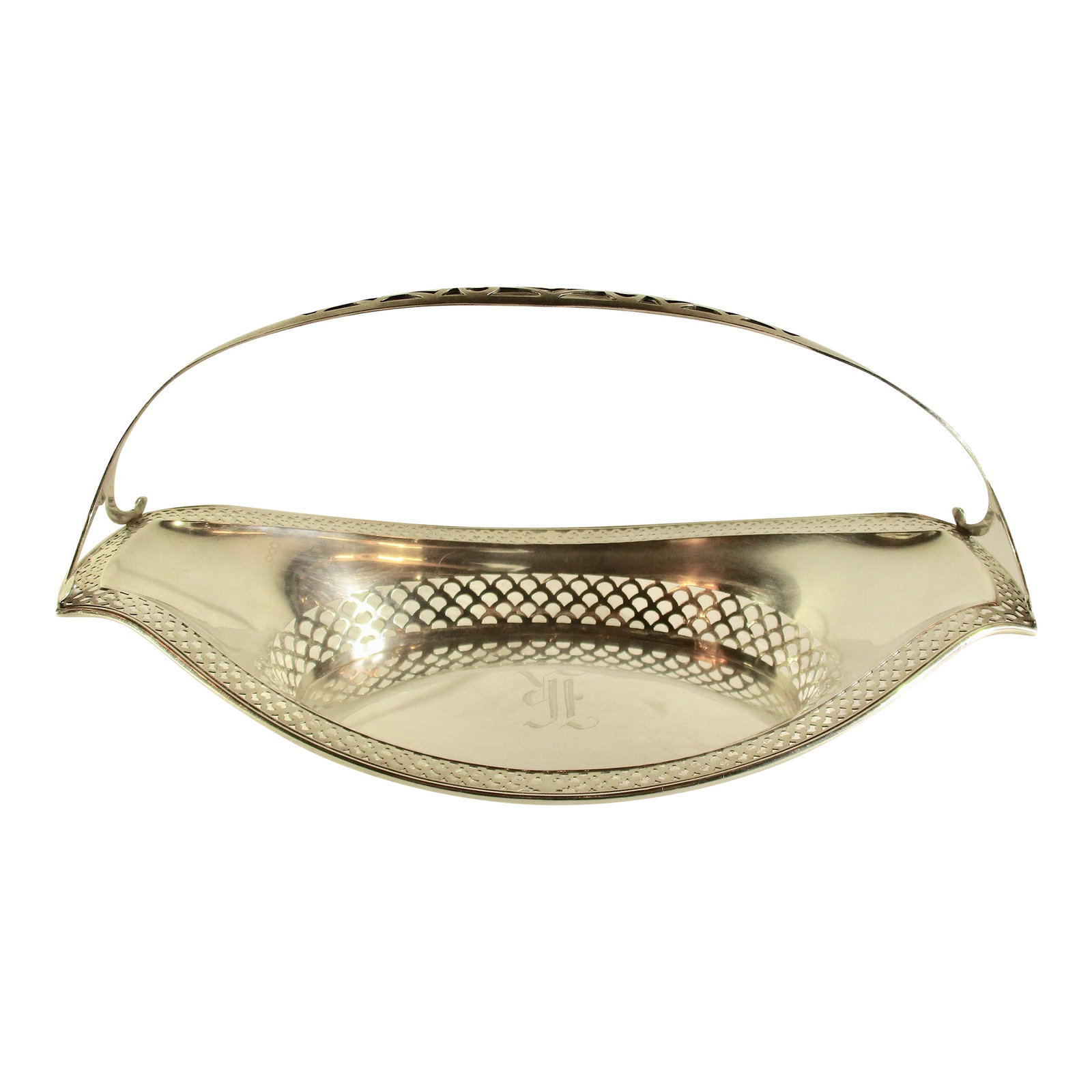 Art Deco Pierced Bread Basket With Handle Sterling 6 Troy Oz.: Sterling silver bread basket from the 1920's . 6 troy ounces. Manufacture by R Wallace & Sons. Pierced work around body and across handle. Monogram K to center of basket.. Size 11.25" long by 6.5