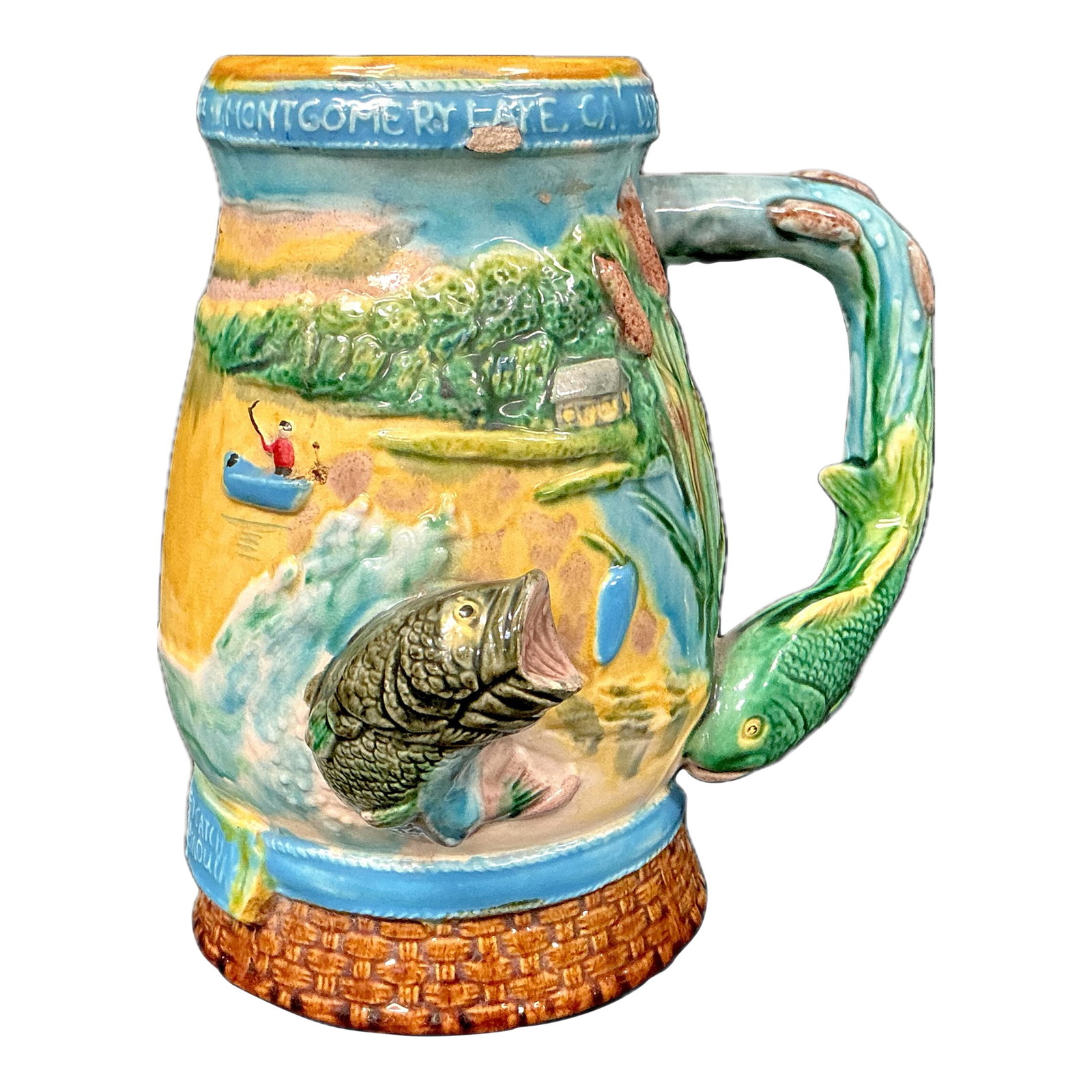 Vintage Majolica Ceramic Fisherman's Tankard: Vintage Majolica Fisherman's Tankard. This tankard or stein features a largemouth bass fish design in vivid colors of blue, green, yellow and brown. This sculptural mug features a beautifully