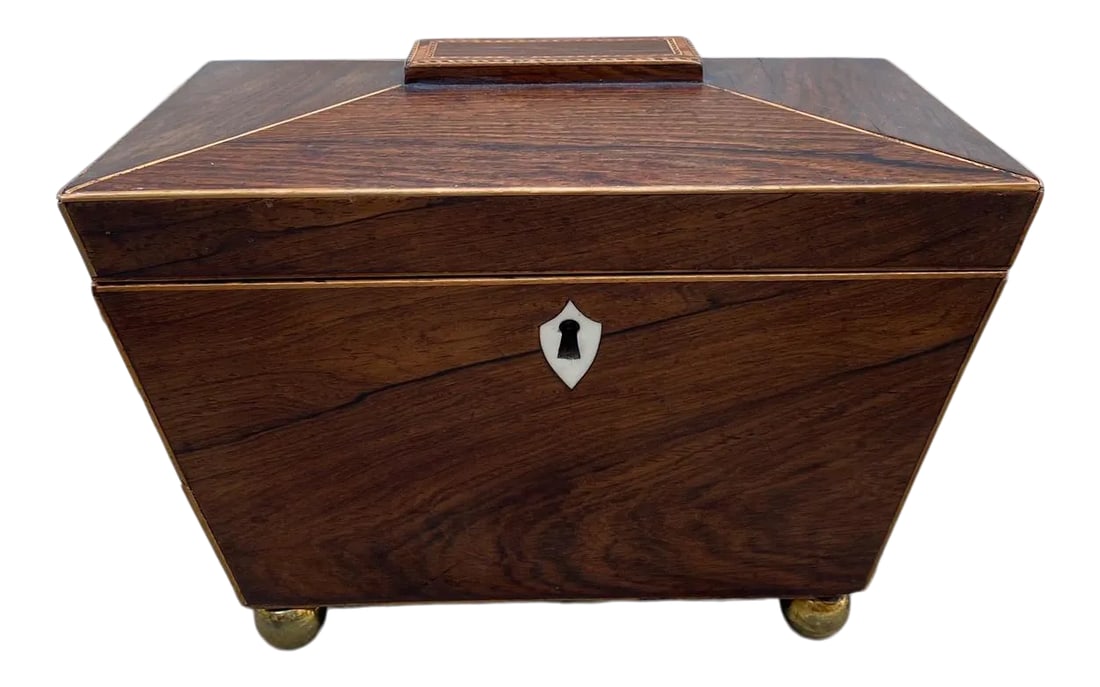 19th Century British Georgian Inlaid Sarcophagus Tea Caddy: All original early 19th century English Georgian inlaid tea caddy in sarcophagus form. The body has a hinged lid with original red top, beautiful escutcheon, knobs and bun feet. Original condition,
