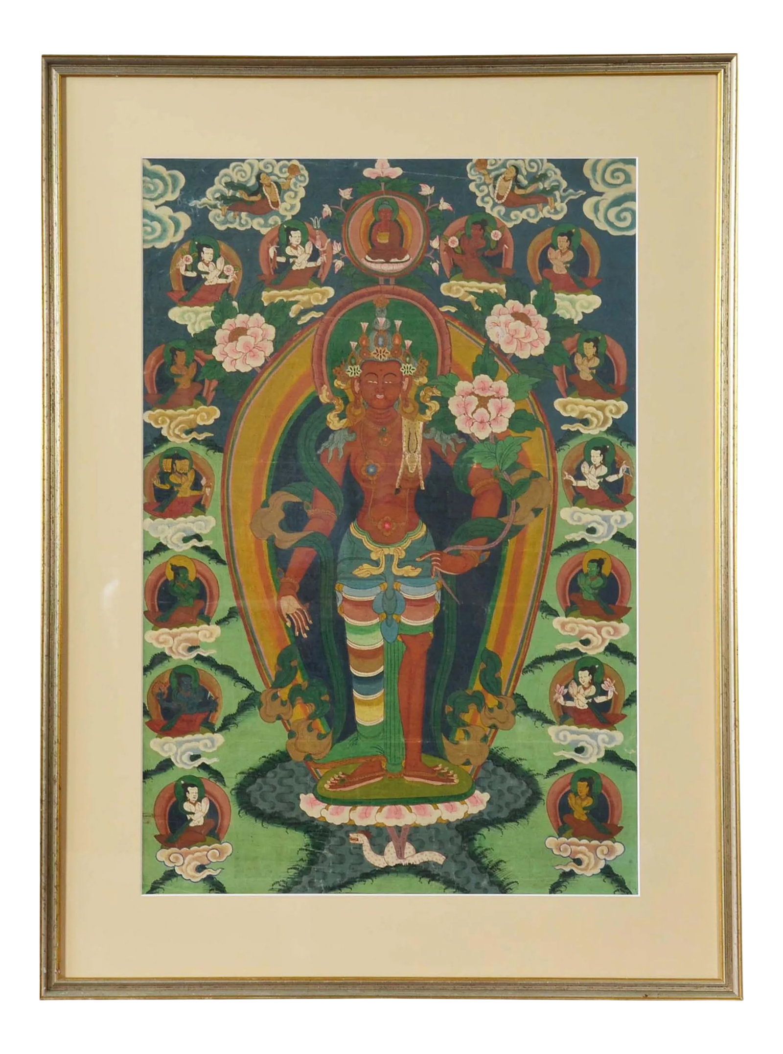 Indian Ceremonial Hindu Deity Hand-Painted on Canvas in Gilded Frame: A framed Indian ceremonial Hindu deity from the mid 20th century, hand-painted on canvas. Created in India during the midcentury period, this scene, hand-painted on canvas and set inside a gilded fram
