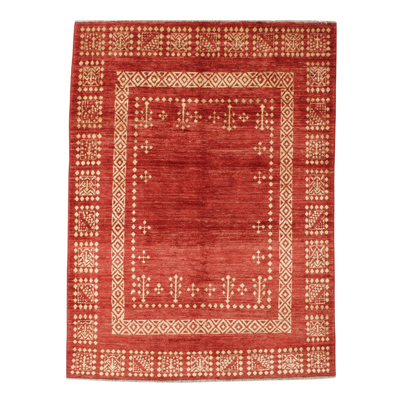 Vintage Hand-Knotted Persian Gabbeh Rug 4'11" X 6'10": Vintage Hand-knotted Persian Gabbeh rug featuring a rich red field framed by ivory geometric borders with repeating tribal motifs. The design combines a strong central field with layered decorative ba