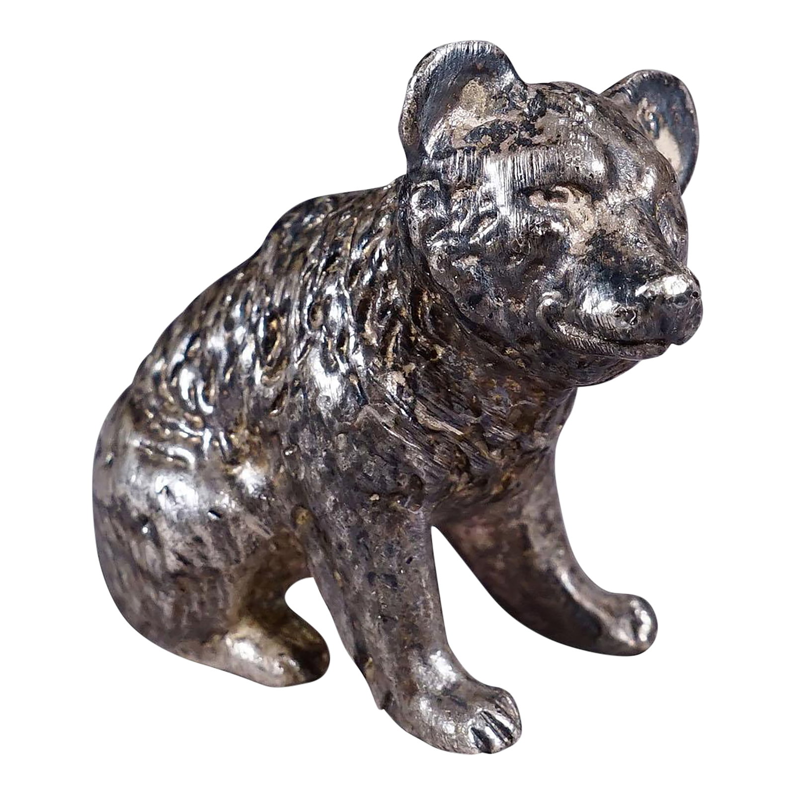 Cast of a Silverplated Sitting Bear Ca. 1930s: Cast of a Silverplated Sitting Bear ca. 1930s Item e7247 A lovely sculpture of a sitting bear made of casted metal and silverplated, Germany 1st half of the 20th century. 75,9 gramm, 2.68 oz. A