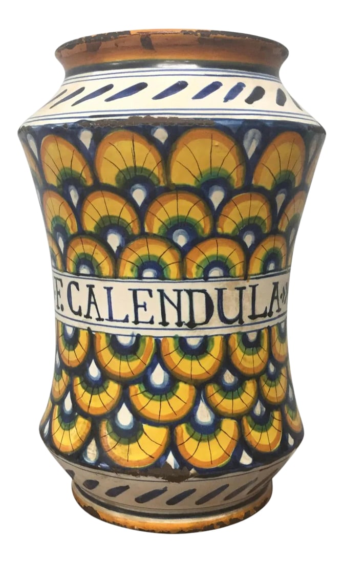 17th Century Italian Yellow Maiolica Pottery Albarello Drug Jar: An impressive 18th century polychrome decorated drug jar or 'Albarello'. The Albarello is of a typical waisted shape, and is decorated profusely in polychrome. The body of the jar is decorated with br