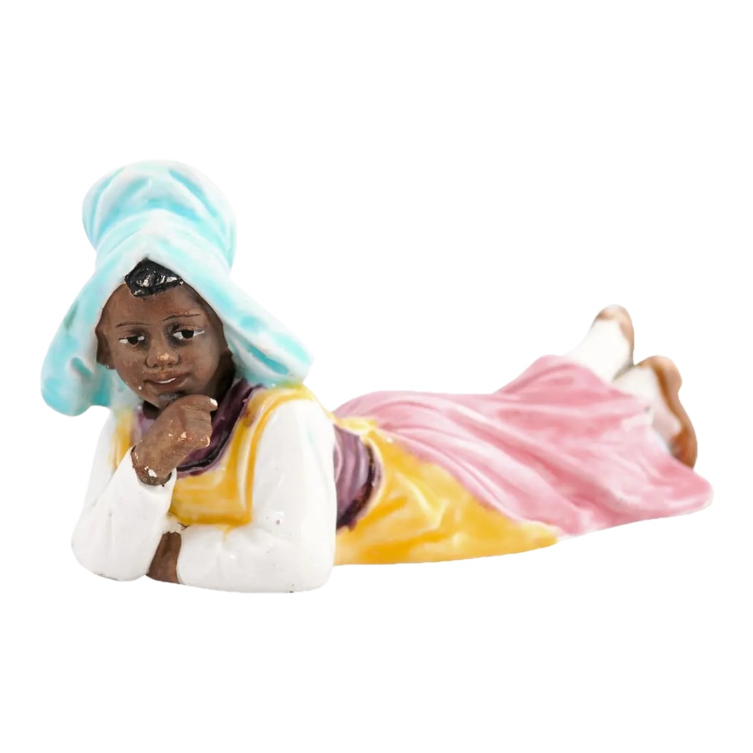 Vintage Petite English Porcelain Figurine Depicting a Young Girl Laying on the Ground: A petite English porcelain figurine from the 20th century, depicting a young farm girl. Created in England during the 20th century, this petite porcelain decorative object charms us with its lovely