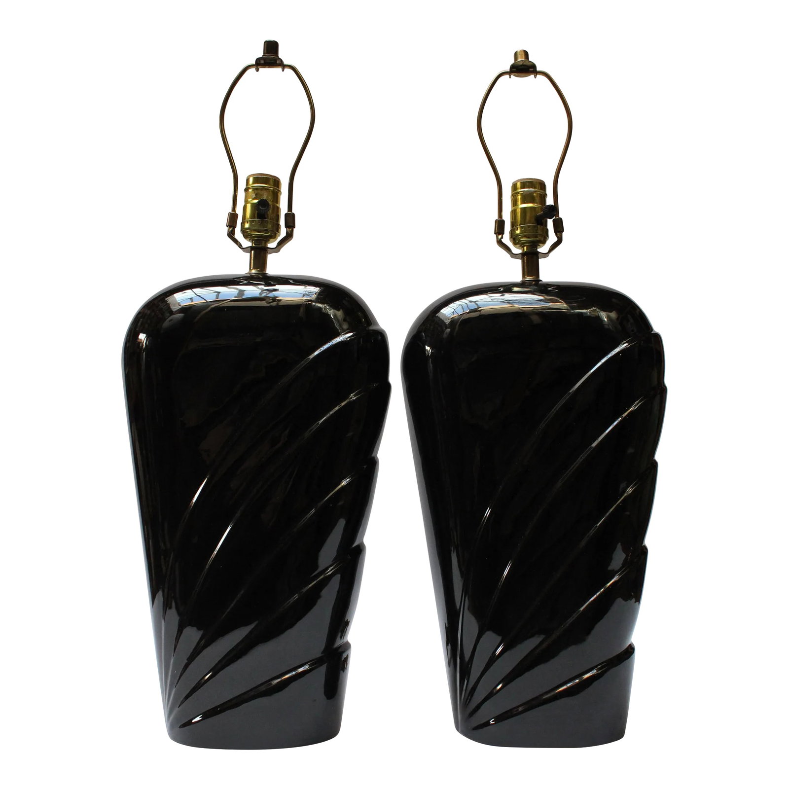 Pair of Postmodern Black Ceramic Table Lamps by O Design: Art Deco-Style black ceramic lamps with linear decoration handmade by O Design Ceramique of Canada (ca. late 1980s). Excellent, vintage condition, newly rewired and ready for immediate use. H: 19.13"