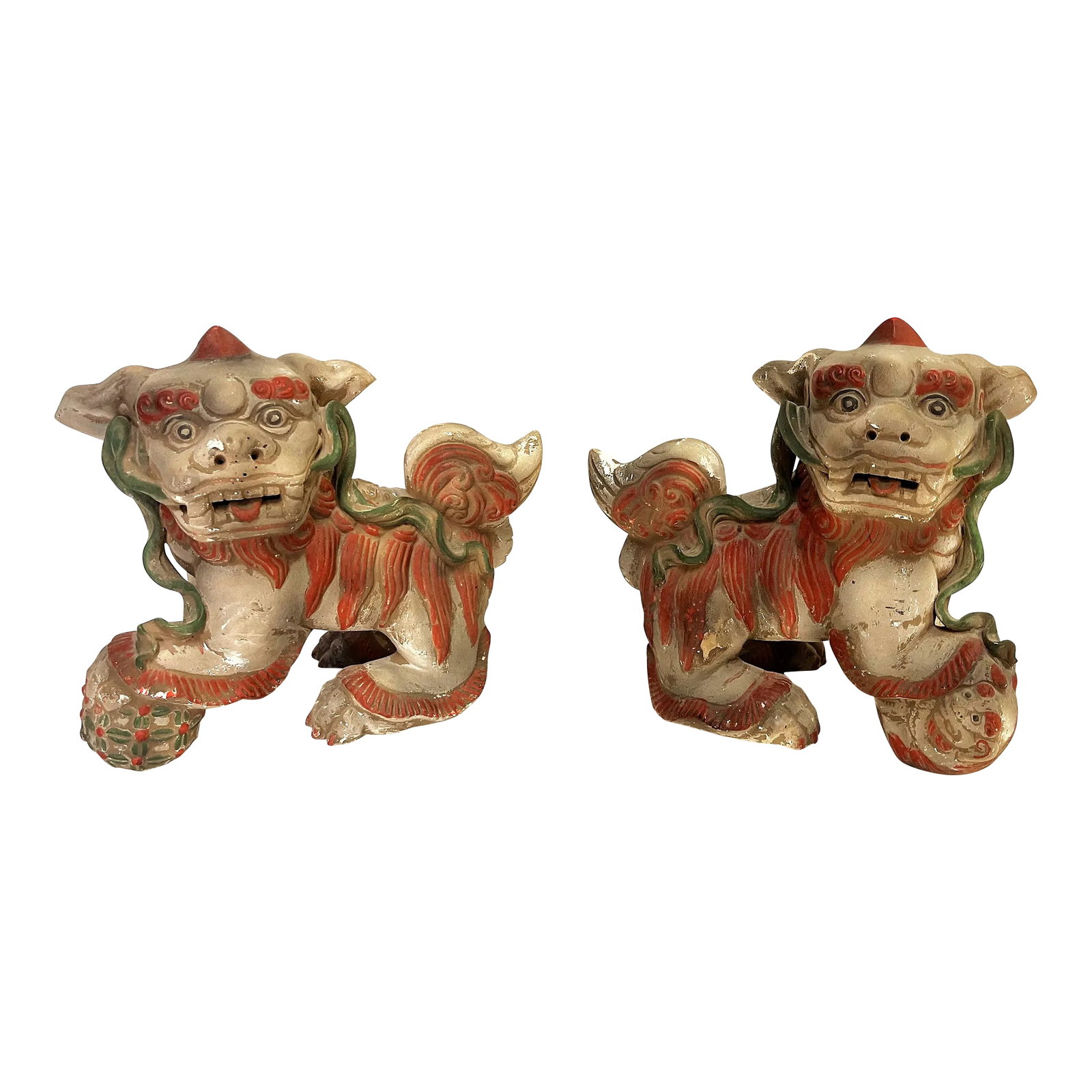 Vintage Chinese Pottery Foo Dogs With an Unglazed Polychrome Finish- a Pair: Rustic looking pair of vintage foo dogs! The pair are made of pottery clay with an unglazed polychrome finish. They have a concrete-like look to them accented with shades of green, terra cotta and