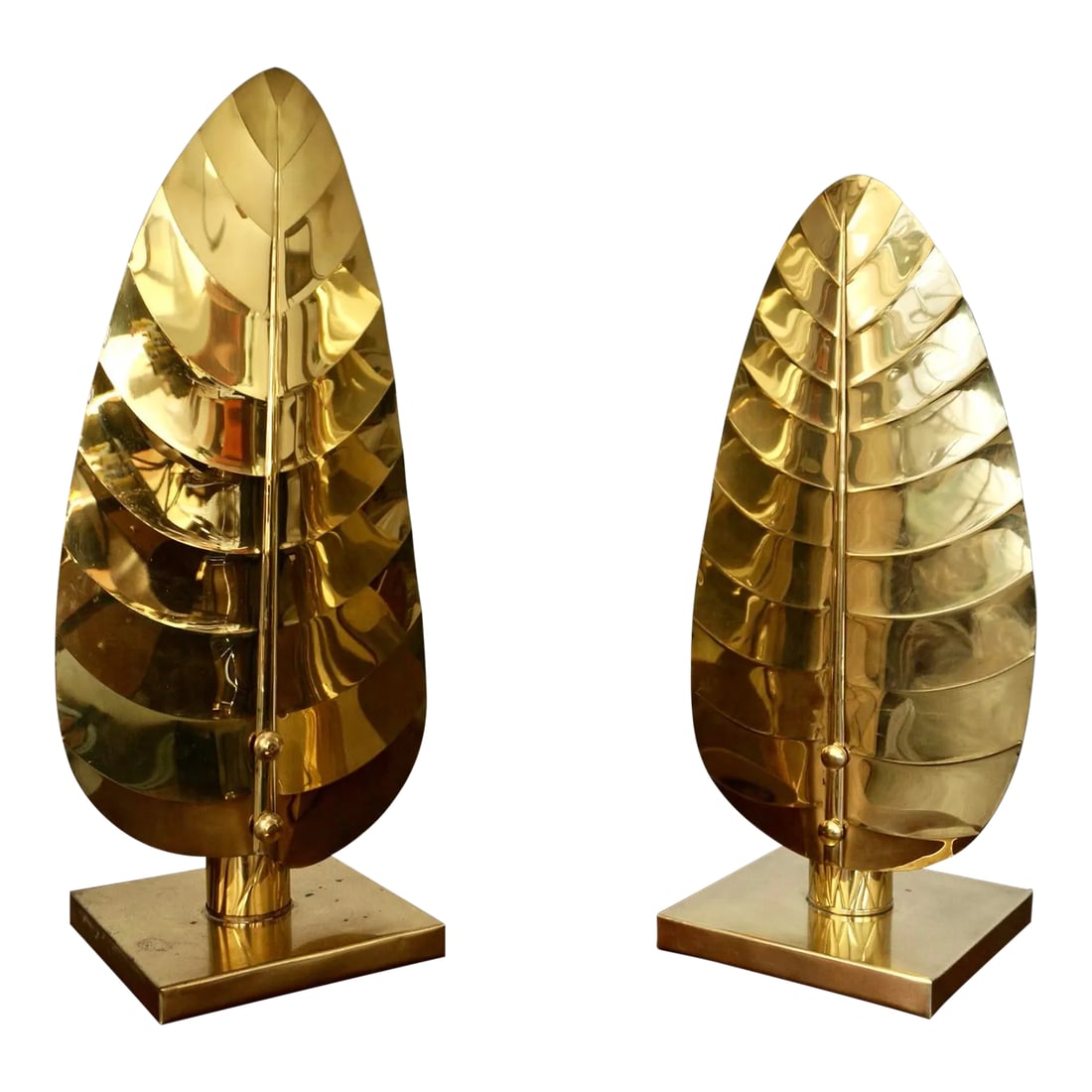 1960's Hollywood Regency Brass Table Lamps - a Pair: Pair of vintage Italian Mid-century Hollywood Regency table lamps for sale. They are brass leaf lamps, and very rare. One is taller than the other, and are in both working condition. They light up