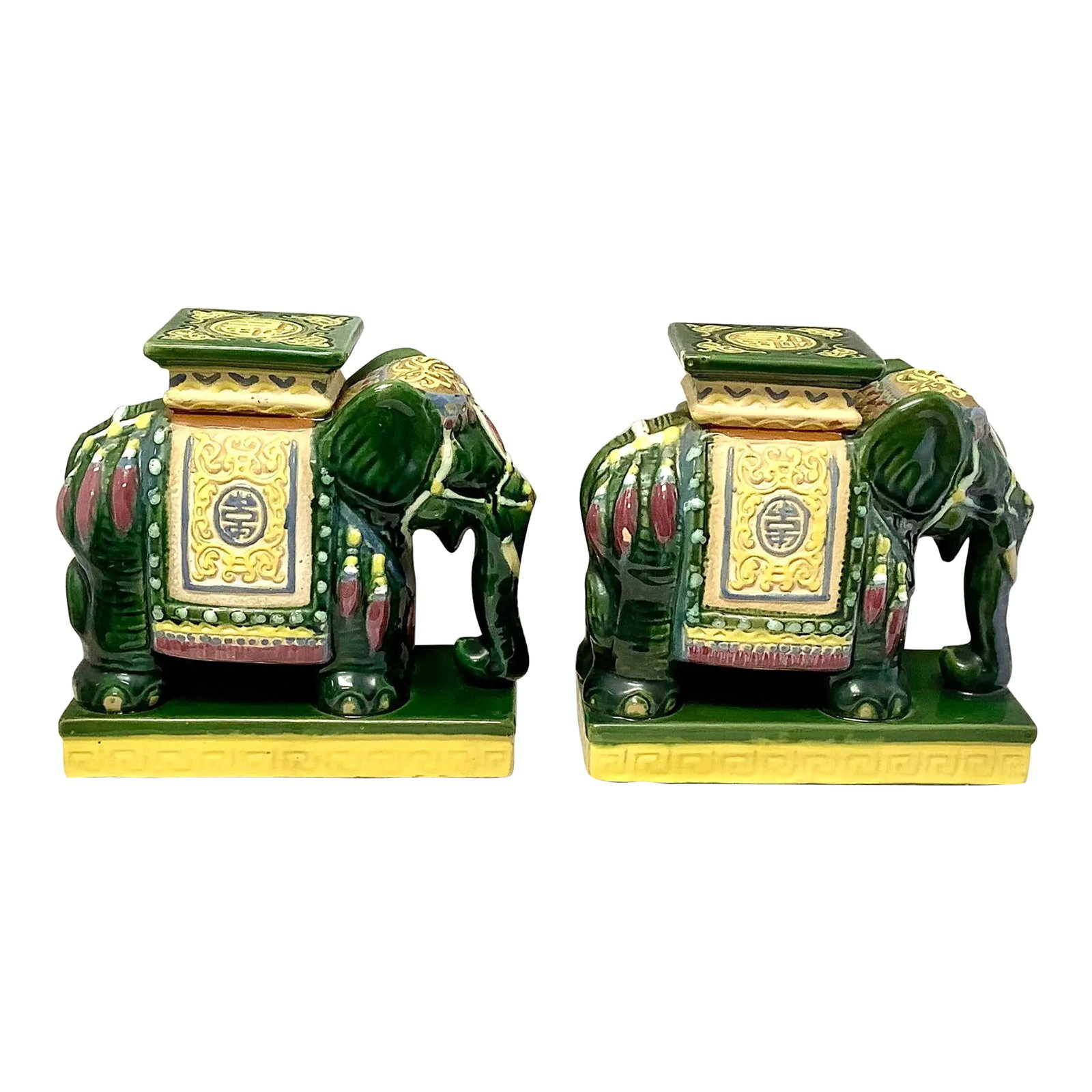 Vintage Pair of Green Ceramic Asian Elephant Statues: Pair of decorative green ceramic Asian elephant statues. Very good condition with age appropriate wear. One small chip in rear top square (see pictures). 7.25Êº Tall X 7.25" wide x 3.25D