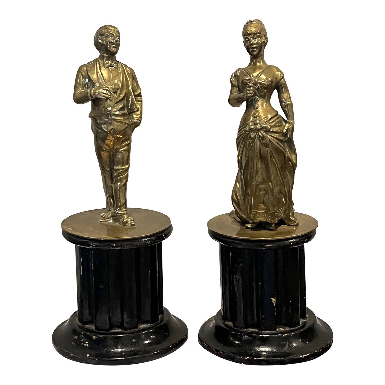 Late 19th Century Pair of Bronze Victorian Figures Mounted on Wooden Plinths: Pair of Victorian Figures on Wooden Plinths – Verdigris Finish This charming pair of Victorian-era figures includes a gentleman in formal attire and a lady in a flowing ball gown, each mounted