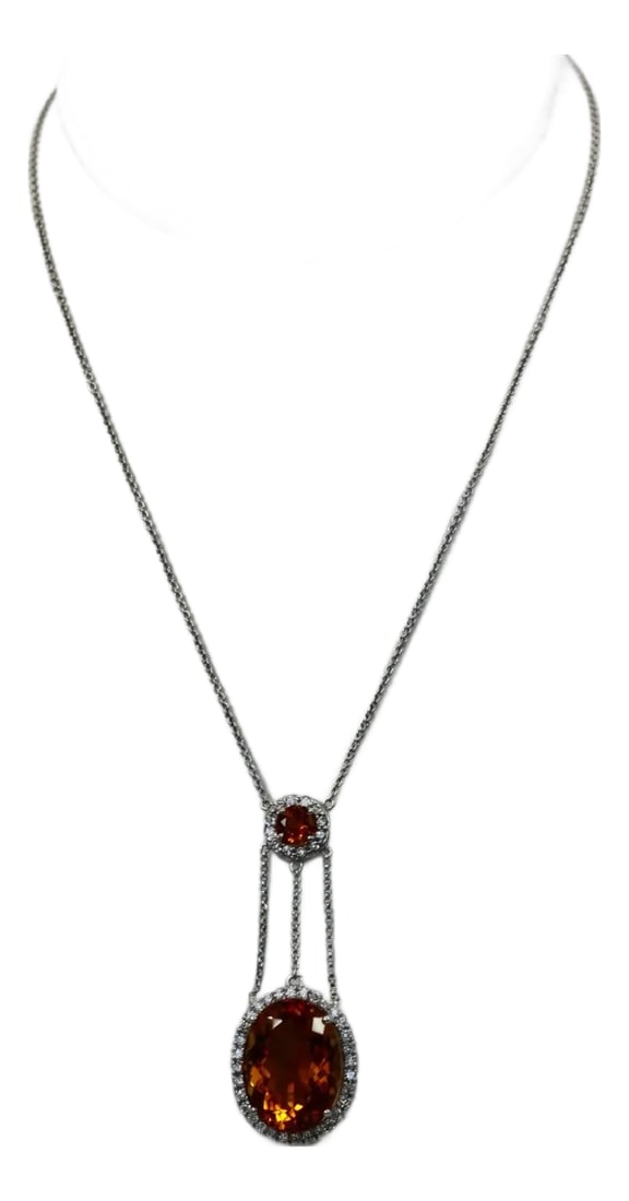 Maderia Mixed Cut Citrine Necklace 20 Plus Carat Diamond Surround: This is part of Chairish's Fine Jewelry assortment. Huge Maderia Mixed Cut Citrine 20 Plus Carat Diamond Surround This gorgeous mixed cut Madeira Citrine is huge and beautiful. This necklace is a