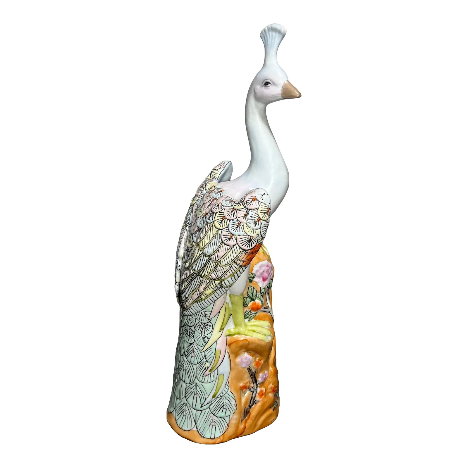 Early 20th Century Chinese Export Famille Rose Peacock Figurine: Beautifully displayed peacock perched confidently. Brilliant colors of peach, pink, blue, yellow, and orange. I love the striking detail in and around the eyes, and how the pink softly blends in with