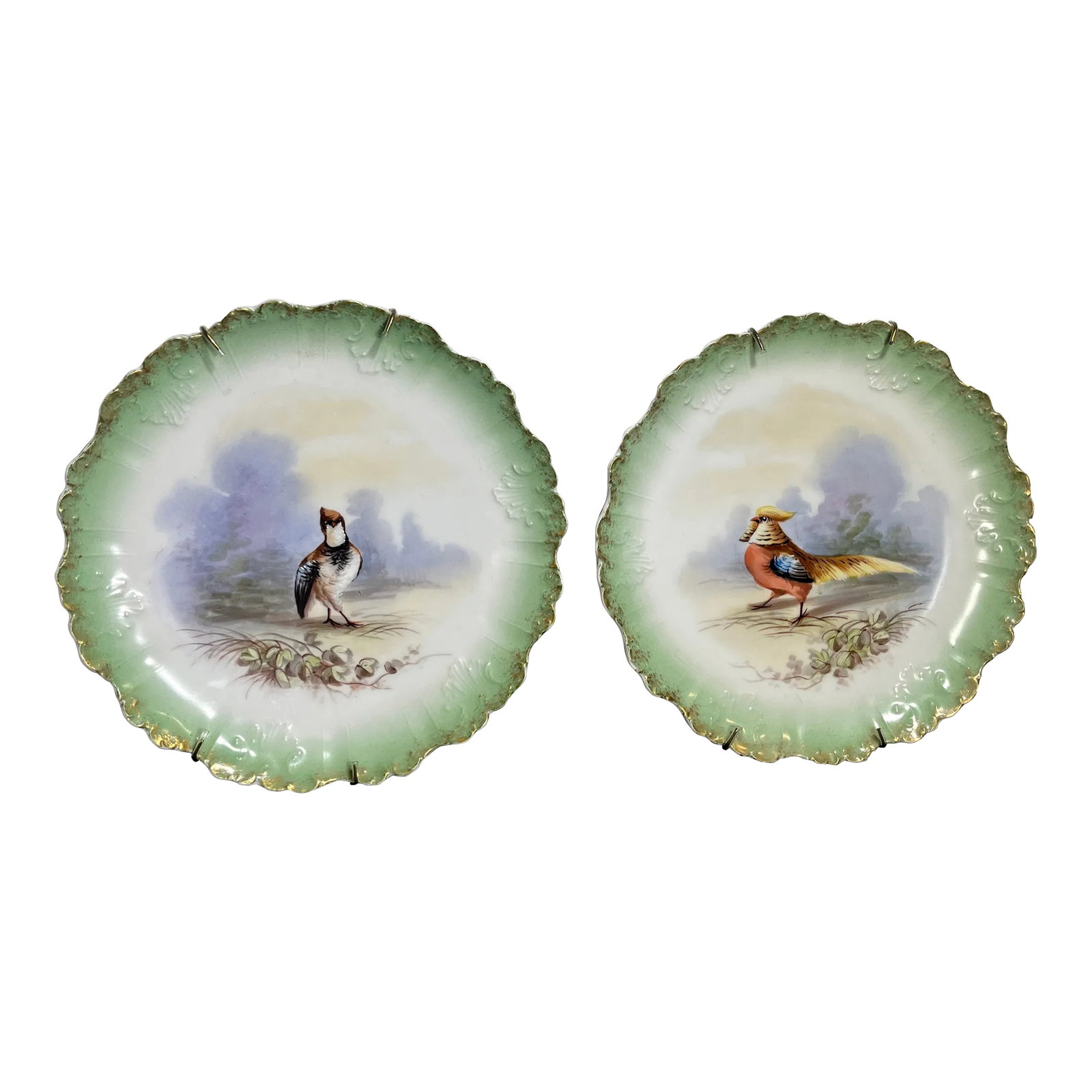 Pair of Antique L S & S Limoges Wall/Cabinet Plates: (2) Hand painted game bird plates with a scrolled and scalloped edge. White background with a shaded lime green border and a hint of gold. Limoges for LS&S representing New York importers, Lewis Strau