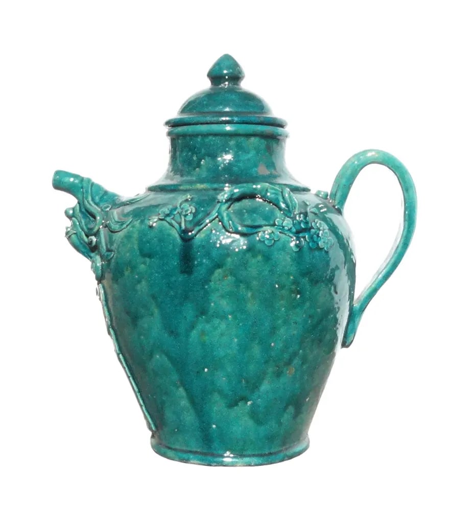 Chinese Ceramic Green Glaze Wine Container Jar: This is a handmade ceramic jar with handle and glazed with oriental green color. The surface is decorated with Chinese character " herbs wine " and dragon mouth motif. It is an interesting accent piec
