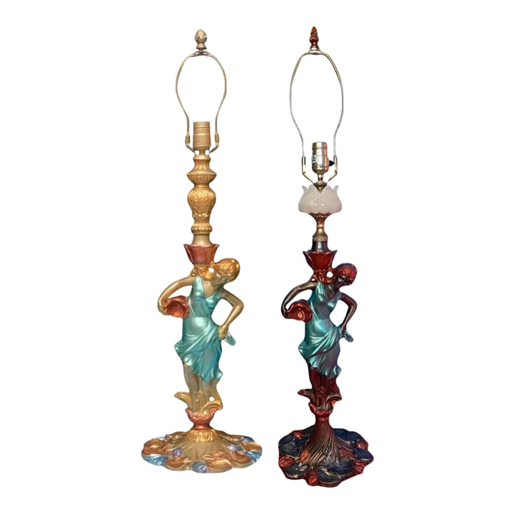 Vintage Water Nymph Spelter Table Lamps - a Pair: Each exquisite mid-century spelter lamp showcases enchanting water nymphs, adorned in identical diaphanous gowns of cerulean blue that ripple like the surface of a tranquil pond. The delicate fabric