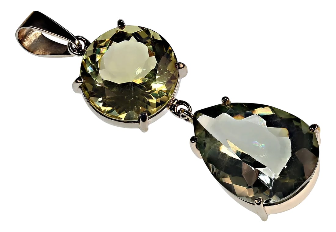 Brazilian Gemstone Pendant From Lemon Quartz and Praziolite: One-of-a-Kind Lemon Quartz and Praziolite Pendant – A Sparkling Masterpiece Discover the allure of this unique Lemon Quartz and Praziolite pendant, a statement piece that showcases the natural b