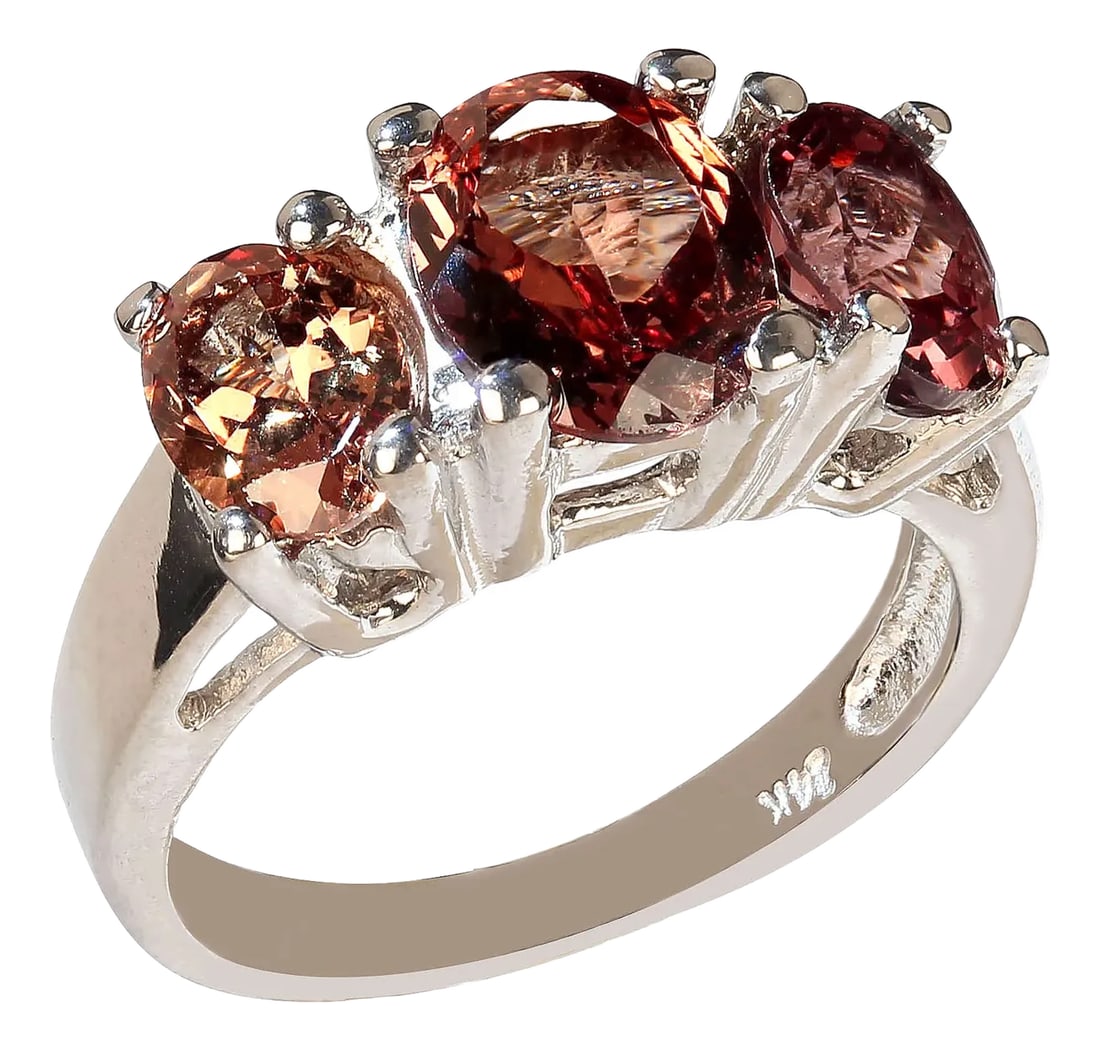 Three Stone Color Shift Garnet Ring in 14k White Gold Setting January Birthstone: 14K White Gold Color-Shift Garnet Ring – A Stunning Tribute for Garnet Lovers and January Babies! Surprise someone special (or treat yourself!) with this exquisite 14K White Gold ring,