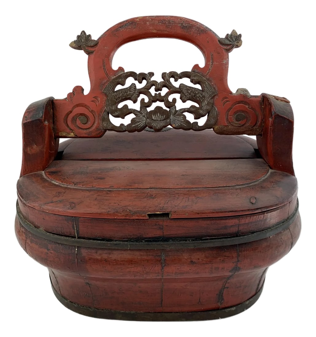Antique Chinese Red Lacquered Wedding Bride Box: Late 19th century antique Chinese Red Lacquered Wedding Bride Box with hand carved ornate pivoting handle. Top is removable and had slide lock underneath. Condition: Alterations: Original Condition