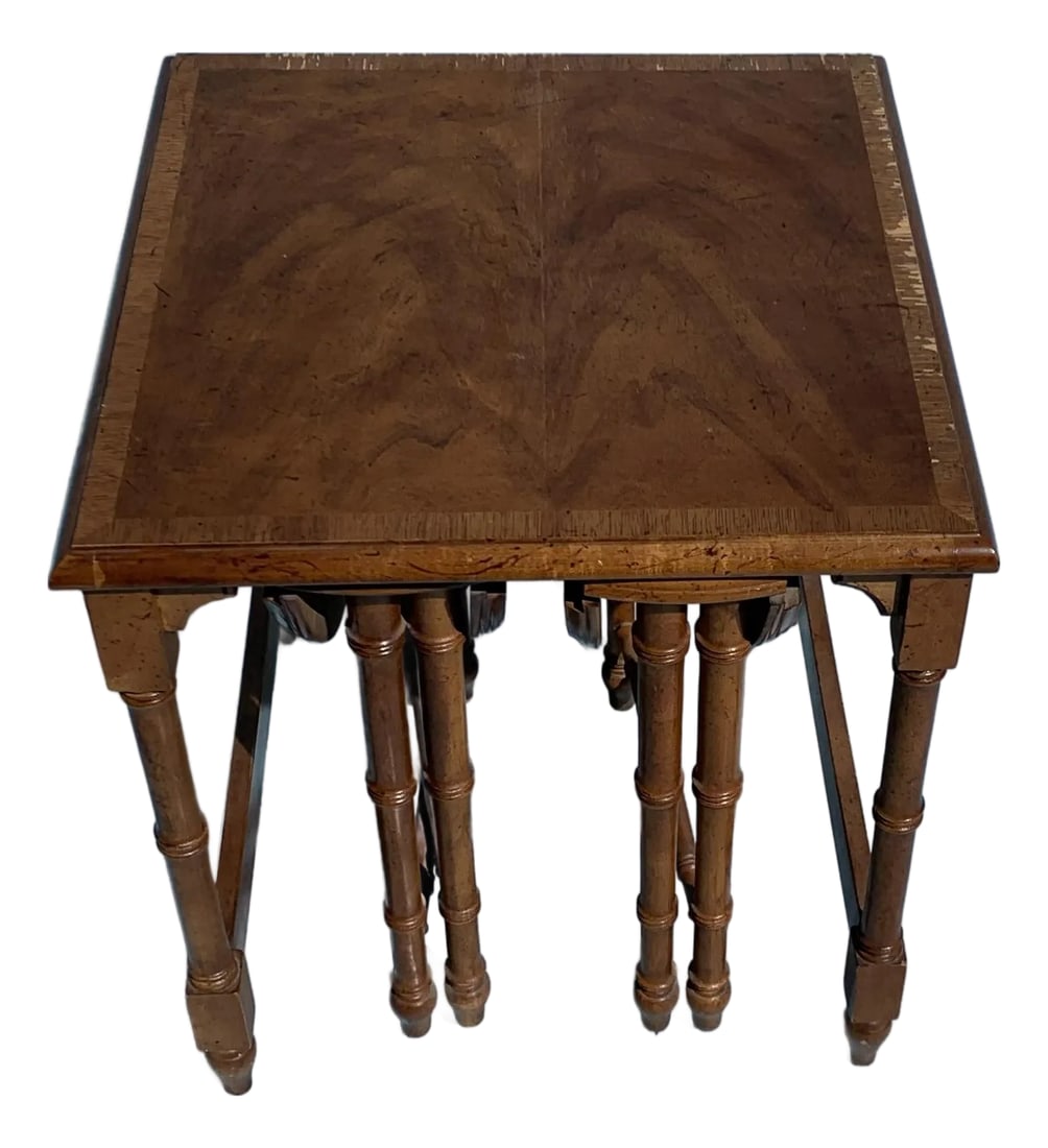 1970s Fruitwood Nesting Side Tables - Set of 3: Vintage 1970s fruitwood side tables with faux bamboo motifs legs. Included are two nesting tables with folding legs. Side table dimensions 16 diameter 20 inches tall. Condition: Alterations: Original