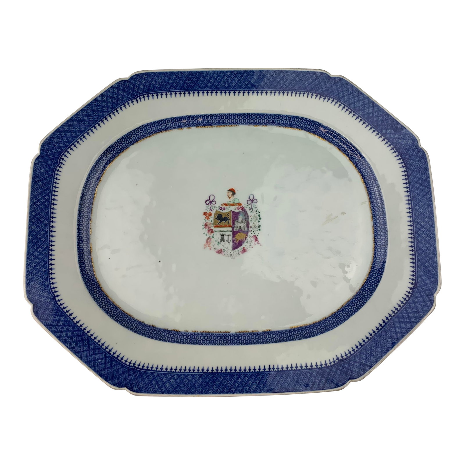 18th Century China Trader Porcelain Serving Platter: 18th Century China Trader serving platter from the collection of Bob and Dolores Hope. This blue and white Chinese export armorial platter has cut corners and an enameled center crest. Condition: Alte