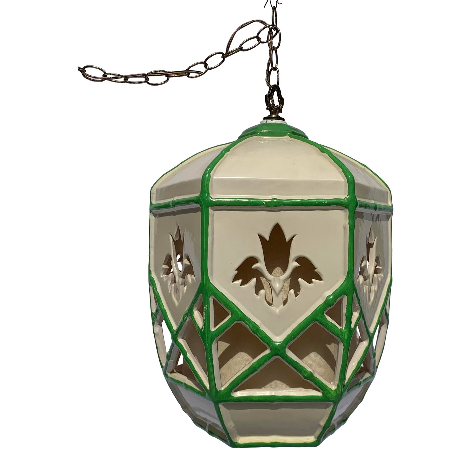 Mid 20th Century Mid-Century Green and White Ceramic Hanging Swag Lamp: Mid-Century hand painted green and white hanging swag lamp with long brass chain. Has interior linen round shade that diffuses light through floral and geometrical carvings. 3 way pull-chain socket. B