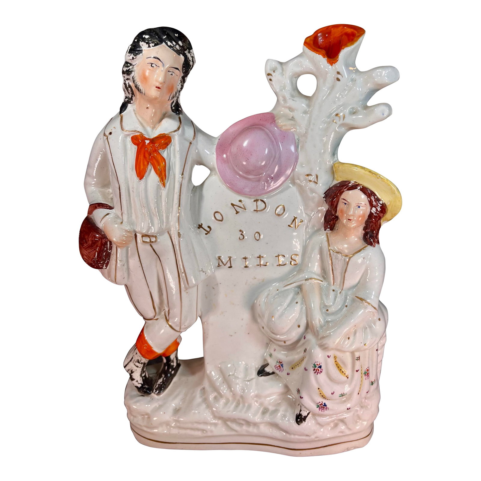 Antique Staffordshire Figure 30 Miles to London: Depicts a man and woman resting by a mile marker indicating the distance to London. Painted in overglaze enamels with gilt highlights. Condition: Alterations: Original Condition Unaltered