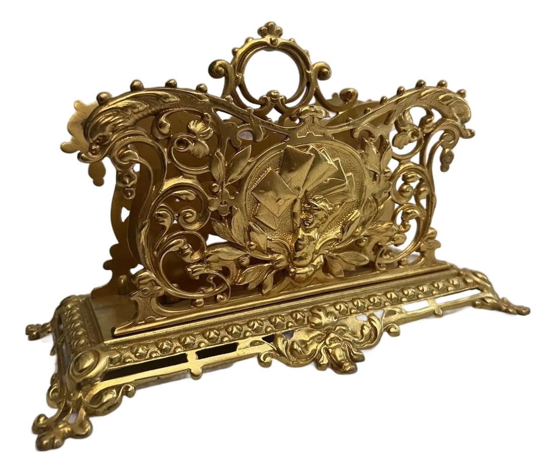 Antique Gilt Bronze Letter Holder Desk Accessory Child Boy Holding Envelops: This Antique Guilt Bronze Letter Holder Desk Accessory features a charming design of a child boy holding envelops, adding a touch of whimsy to any desk. Made in the United States in the late 19th cent
