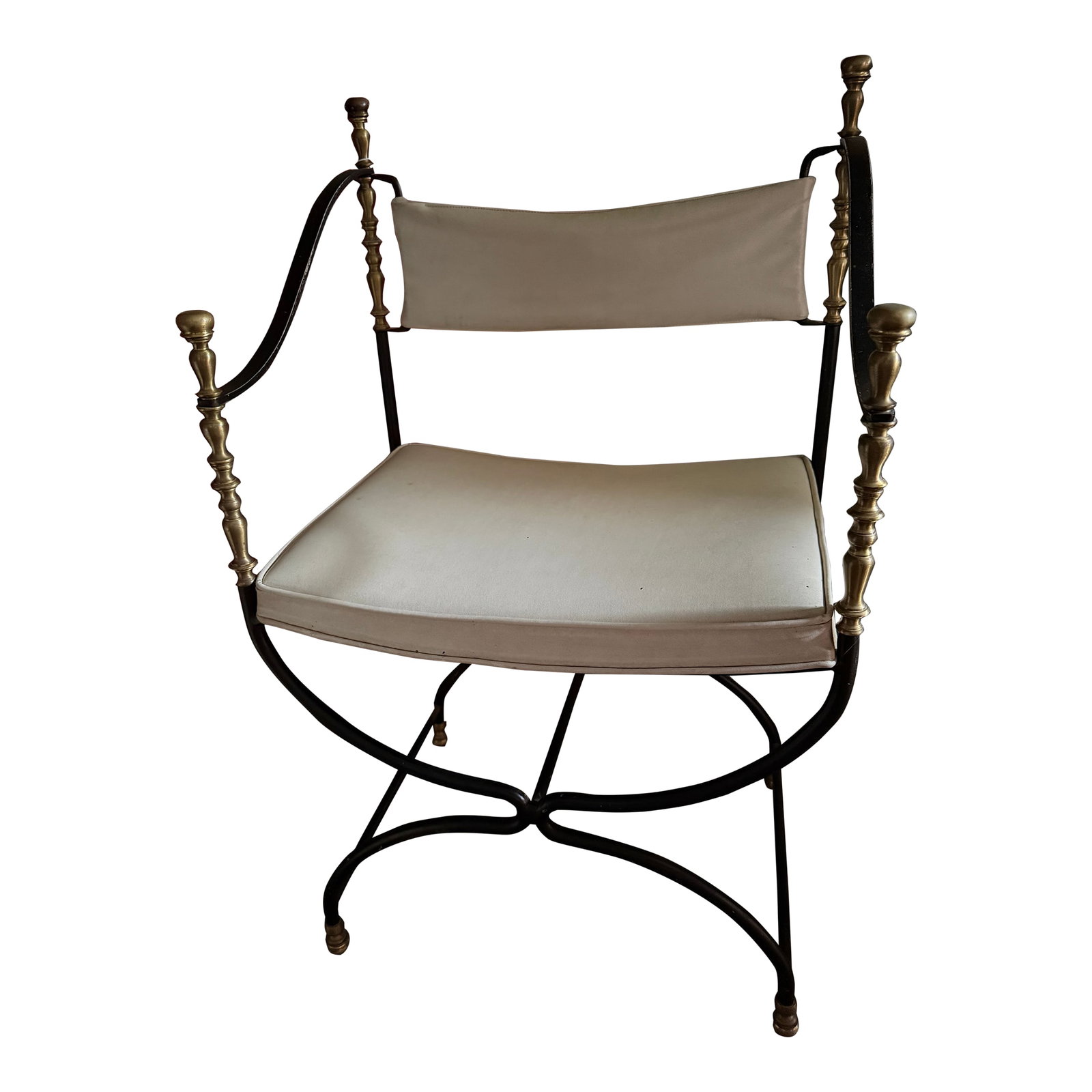 Savonarola Style Iron Chair: This pair of Italian wrought iron upholstered Savonarolla style armchairs captures the grandeur and craftsmanship of Renaissance-inspired design. The chairs feature bold wrought iron frames,