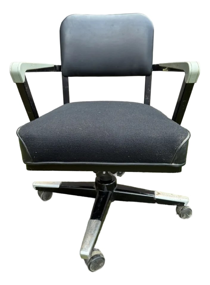 1960s MCM Rolling Swivel Tanker Chair by McDowell and Craig: Ready to roll with this industrial gem! An ergonomic swiveling desk or office chair finished in a pewter color and hand welded steel construction, this chair by McDowell & Craig is reminiscent of the 