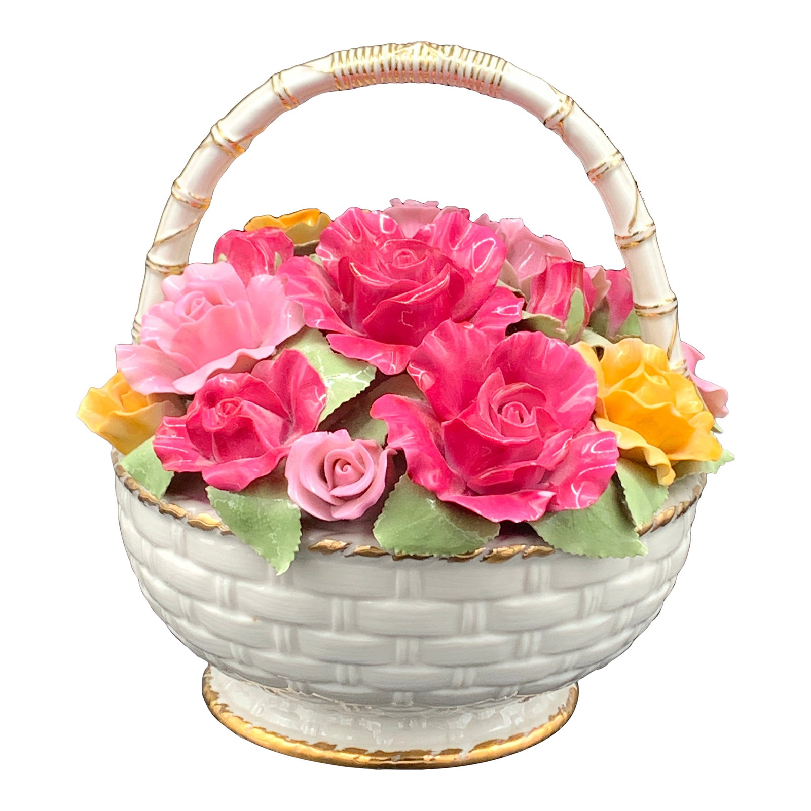 Royal Albert Musical Basket 'Old Country Roses': Royal Albert ceramic Old Country Roses Musical Basket that was first launched in 1962. The fine bone china/porcelain, adorned with 22 kt gold trim, and features a basketweave design. It is filled