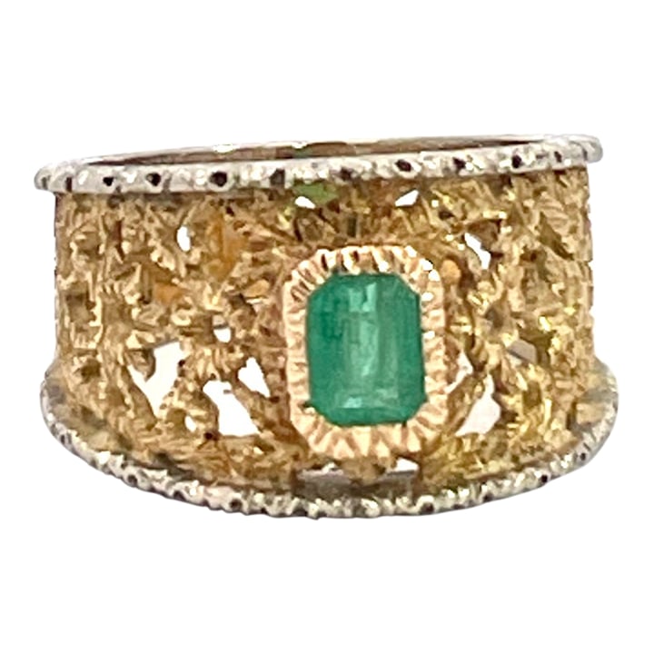 18k Renaissance Inspired Ring W/Emerald Center, Size 7.25: This magnificent wide band ring exemplifies fine Italian Renaissance-inspired craftsmanship, reminiscent of the celebrated Buccellati style. This broad yellow Gold band features an exquisite openwork