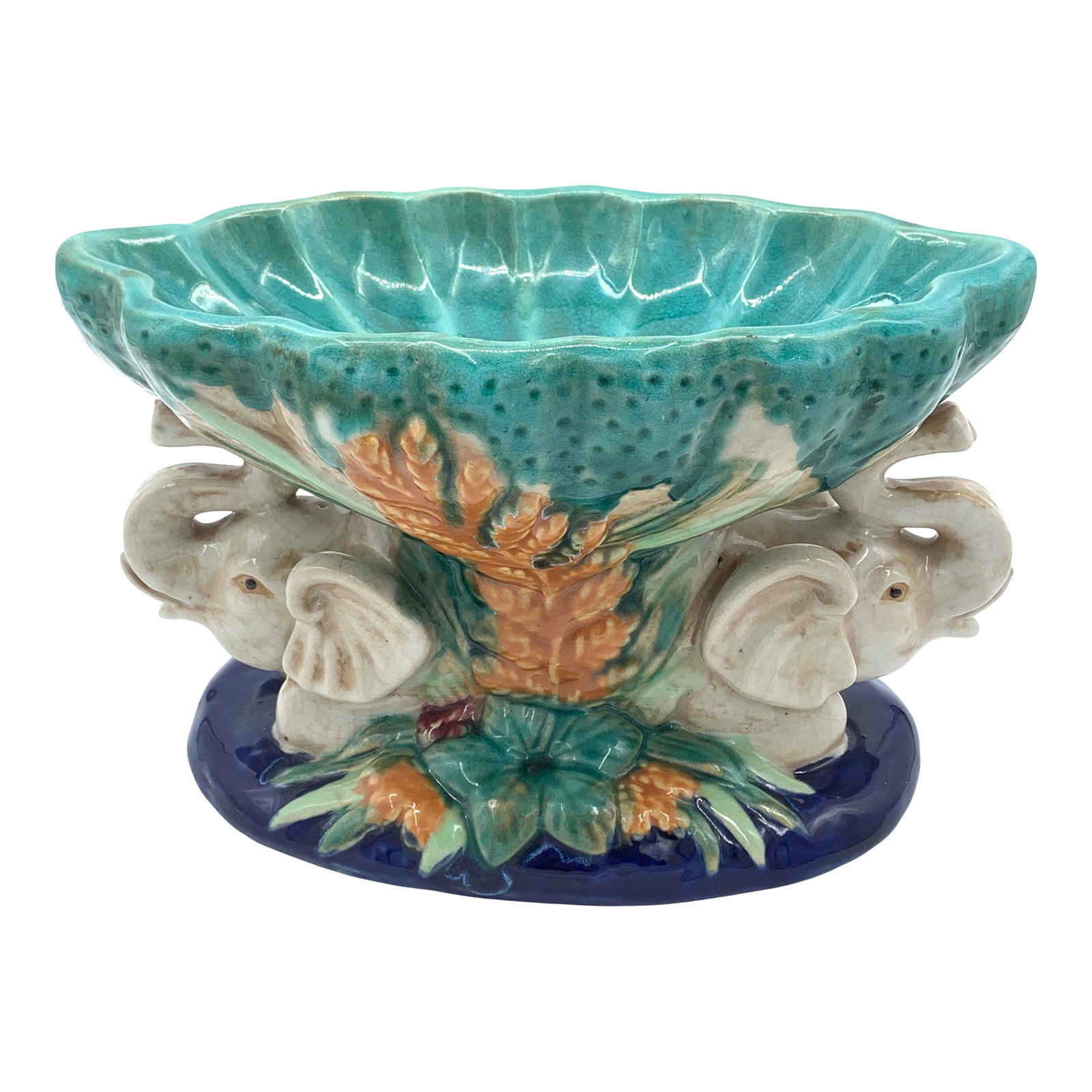 Vintage Italian Majolica Elephant Pedestal Centerpiece: Vintage Italian Majolica Elephant Pedestal Centerpiece! This collectible piece embodies the rich artistic tradition of Italian Majolica, known for its vibrant colors and intricate designs. Features a